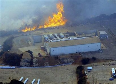 Flames edge near Rocketdyne's Santa Susana Field Laboratory, part of a company that builds and develops rocket engines, near Simi Valley, Calif., Thursday, Sept. 29, 2005. 