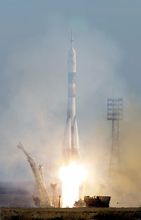 A Russian Soyuz TMA-7 spacecraft, with the ISS crew of U.S. space tourist Gregory Olsen, astronaut William McArthur of the U.S. and cosmonaut Valery Tokarev of Russia, blasts off from the launching pad at Baikonur cosmodrome in Kazakhstan October 1, 2005. 
