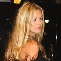 Kate Moss arrives at a party at New York's Museum of Natural History, on Sept. 12, 2004. British prosecutors are advising police in their investigation of the British supermodel's alleged cocaine use, the Crown Prosecution Service said Friday, Sept. 30, 2005. 