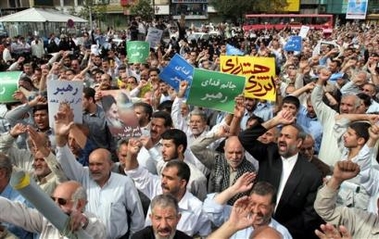 Iranians chant slogans to support Iran's nuclear program, in Tehran on Friday Oct. 7, 2005. (AP