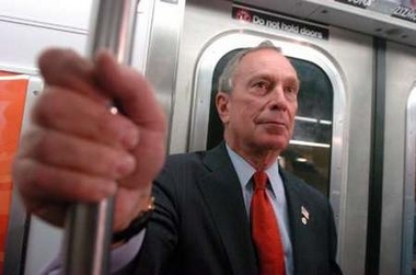 New York City Mayor Michael Bloomberg rides the subway downtown to City Hall in New York October 7, 2005, amid reports of a terrorist threat to the NYC subway system was revealed last night.