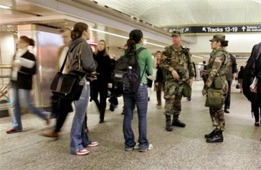 Soldiers patrol the Long Island Rail Road area of New York's Penn Station, Tuesday, Oct. 11, 2005.