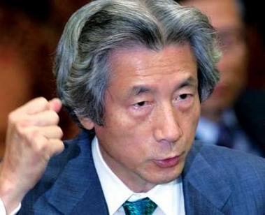 Japan's Prime Minister Junichiro Koizumi speaks at a special parliamentary committee on postal privatisation at the upper house in Tokyo October 13, 2005. The upper house is expected to pass bills on Friday to privatise Japan Post, which includes the world's biggest deposit-taking institution.
