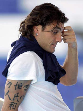 MARCO MATERAZZI tattoos. The VETRUVIUS man. DA VINCI. And the PENTAGRAMS