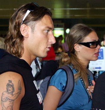 Francesco Totti with gladiator tattoos on his right arm, totti player as 