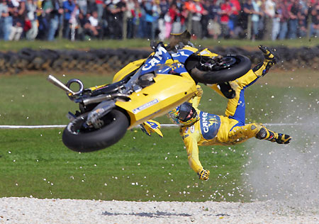 MotoGP rider Alex Barros of Brazil crashes his Yamaha at high speed during the Australian Motorcycle Grand Prix at Phillip Island race track near Melbourne October 16, 2005.
