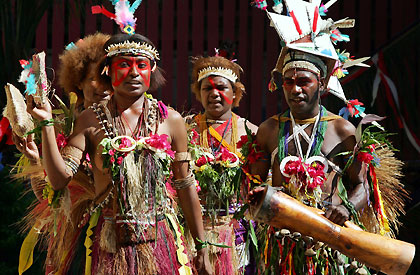 iss Traditional contestant Michelle Pala (L) from the Central Highlands Province performs during a competition in the Papua New Guinea capital city of Port Moresby October 29, 2005.