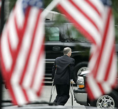 ice President Dick Cheney's chief of staff Lewis 'Scooter' Libby walks out of the West Wing towards the Eisenhower Executive Office Building earlier Friday before resigning from his position at the White House in Washington, D.C., October 28, 2005