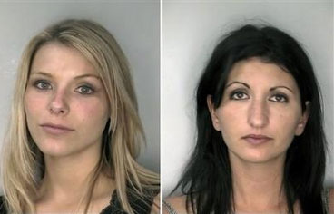 Two Carolina Panthers cheerleaders were charged after their arrest at a bar where witnesses told police the women had sex in a restroom.