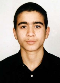 A family portrait of Omar Khadr, who is detained by United States forces at Guantanamo Bay, is shown at a press conference in Toronto in this February 9, 2005 file photo.