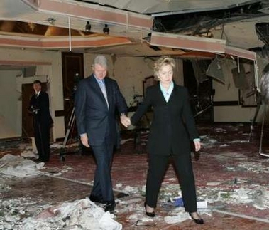 Former U.S. president Bill Clinton (L) and his wife U.S. Senator Hillary Clinton visit the Radisson SAS hotel in Amman November 13, 2005. 