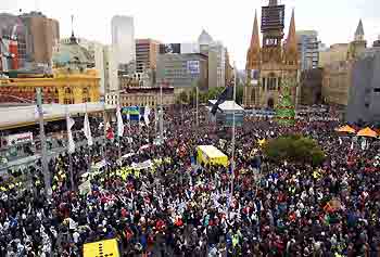 Australian workers rally in Federation Square before a march, during a demonstration against the federal government's proposed industrial relations changes in Melbourne November 15, 2005. [Reuters]