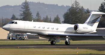 A Nike Inc. corporate jet makes a successful landing after having landing gear problems in Hillsboro, Oregon on November 21, 2005.