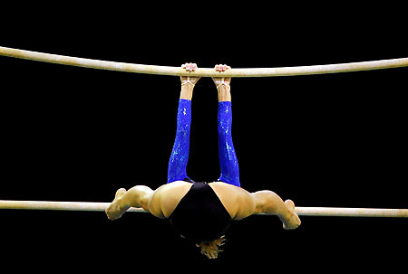 2Tina Erceg of Croatia competes in a qualifying session of the women's Uneven Bars at the Artistic Gymnastics World Championships at Rod Laver Arena in Melbourne, November 23, 2005. The 38th Artistic Gymnastics World Championships are being held in Melbourne between November 22 and 27.