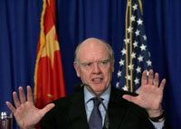Treasury Secretary John Snow speaks during a news conference in Beijing October 17, 2005
