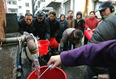 China cut off water supplies to more communities along a poisoned river in its northeast Monday as it celebrated the return of running water to the city of Harbin. 