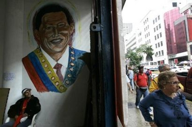 A mural of Venezuela's President Hugo Chavez is seen in an apartment building belonging to a nonprofit housing association called 'Comite de los Sin Techos' in Caracas, Venezuela, Monday, Dec. 5, 2005, one day after congressional elections.