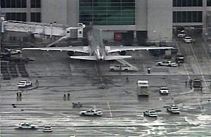 American Airlines Flight 924, a Boeing 757, pictured in this image taken from video, sits at Gate 42 at Miami International Airport, December 7, 2005.