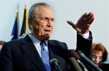 US Defense Secretary Donald Rumsfeld talks to reporters following a meeting with members of Congress on Capitol Hill Thursday, Dec. 8, 2005, on the war in Iraq. (AP