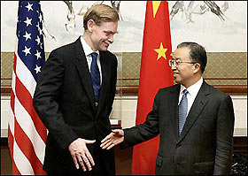 US Deputy Secretary of State Robert Zoellick (L) greets Chinese Deputy Foreign Minister Dai Bingguo in Beijing, August 2005. 