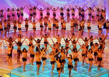 Miss World Contestants take the stage wearing swimwear at a dress rehearsal for the Miss World Final to be held in the Chinese Island resort in Sanya, China Friday Dec. 9, 2005.