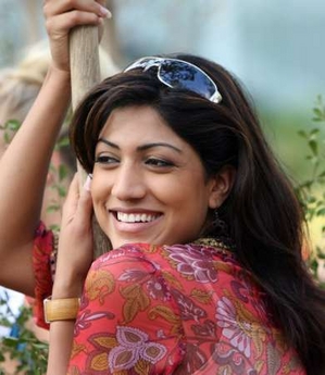 Miss India Sindhura Gadde poses during a tree planting event at the Beauty Crown Centre in downtown Sanya on China's Hainan island December 9, 2005.