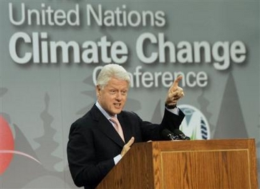 Former President Bill Clinton speaks to reporters after addressing the United Nations Climate Change Conference in Montreal, Friday, Dec.9, 2005