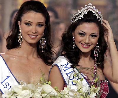 The newly crowned Miss Lebanon 2005 Gabrielle Bou Rashed (R) stands next to the first runner up Anabella Hilal in Beirut December 10, 2005. Bou Rashed defeated 30 other contestants over five rounds to win the title of Miss Lebanon 2005 at a ceremony held at Casino Du Liban.