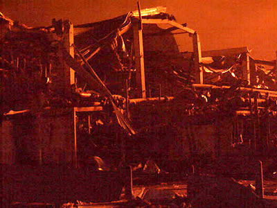 2A view of the site of the explosion at a fuel depot in Hemel Hempstead in central England December 11, 2005. 