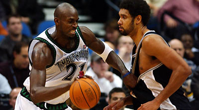 Wally Szczerbiak, Kevin Garnett and Marko Jaric of the Minnesota