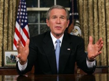 US President Bush is photographed shortly after a live address to the nation about U.S. involvement in Iraq from the Oval Office, December 18, 2005. [Reuters]