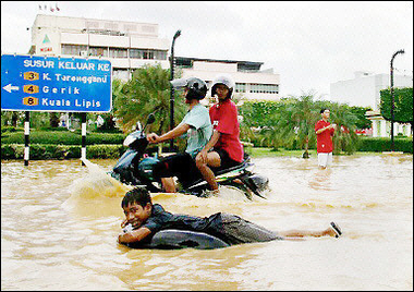 A flooded road in the northeastern town of Kota Bahru in December 2004.