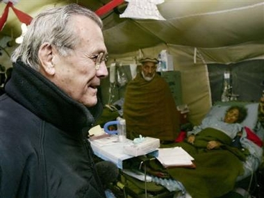 U.S. Secretary of Defense Donald H. Rumsfeld tours a Mobile Army Surgical Hospital (MASH) in Muzaffarabad, Pakistan, on Wednesday Dec. 21, 2005.