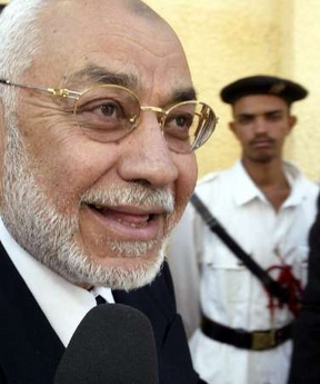 Mohamed Mahdi Akef, leader of the Egyptian Muslim Brotherhood, speaks to reporters after casting his vote in Cairo in this September 7, 2005 file photo. 