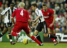 Newcastle United's Michael Owen, second right, in action during their English Premier League soccer match against Liverpool at Anfield, Liverpool, England Monday Dec. 26, 2005.