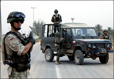 This picture released by the Multi-National Force-Iraq in September 2004 shows Polish soldiers patrol the city of Hilla in Iraq.