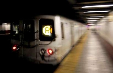 A Metropolitan Transit Authority (MTA) R-train streaks through the Canal Street subway station in downtown New York December 23, 2005.