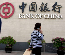 Bank of China will apply to list its shares on the Hong Kong Stock Exchange early next year, the China Securities Journal reported Thursday.