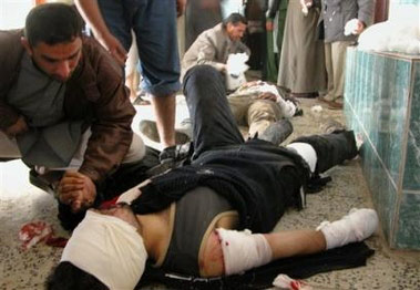 Suicide bombers targeted Shiite pilgrims in the south and police recruits in central Iraq, and a roadside bomb killed five U.S. soldiers, bringing Thursday's death toll to at least 130 people in a series of attacks as politicians tried to form a coalition government.