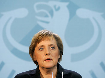 German Chancellor Angela Merkel makes a statement at the Chancellery in Berlin in this January 3, 2006 file photo. Merkel, in an interview published days before her first visit to the United States, said Washington should close its Guantanamo Bay prison camp and find other ways of dealing with terror suspects. "An institution like Guantanamo can and should not exist in the longer term," Merkel said in an interview with the weekly magazine Der Spiegel published on January 7, 2006. 