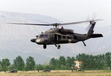 A U.S. Army Black Hawk helicopter went down in northern Iraq, killing all 12 Americans believed to be aboard in the deadliest crash in nearly a year, while five U.S. Marines died in weekend attacks, the military said Sunday.