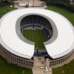 The Olympic stadium in Berlin is seen in this October 1, 2005 file picture. Germany's World Cup stadiums have serious safety problems just five months before the tournament begins as lessons from past disasters seem to have been ignored