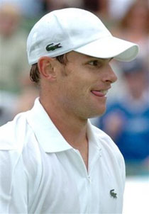 Andy Roddick of the U.S. smiles during his match against Gael Monfils of France at the Kooyong Classic in Melbourne, Australia, Wednesday Jan. 11, 2006. 