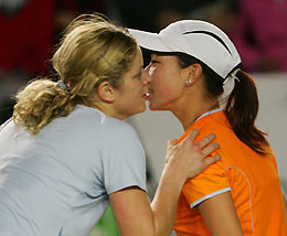Kim Clijsters of Belgium (L) kisses Zheng Jie of China after their match at the Champions Challenge 2006 in Hong Kong January 5, 2006. Clijsters won 3-6 6-2 6-2.