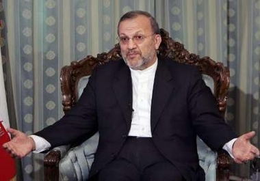 Iran's Foreign Minister Manouchehr Mottaki speaks to Reuters correspondent during an interview in Tehran January 15, 2006. Mottaki accused the European Union on Sunday of over-reacting to Tehran's resumption last week of atomic research and urged it to return to negotiations.