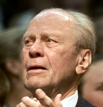 Former U.S. president Gerald Ford acknowledges the cheers from the crowd following a tribute in his honor at the Republican National Convention in Philadelphia in this August 1, 2000 file photo. Ford was admitted to a California hospital on January 16, 2006 for the treatment of pneumonia, according to his spokeswoman Penny Circle.