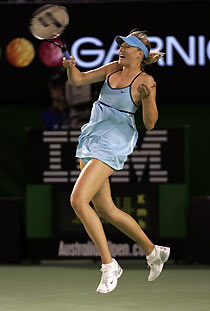 Maria Sharapova of Russia hits a return against Ashley Harkleroad of the U.S. during the Australian Open tennis tournament in Melbourne January 18, 2006.
