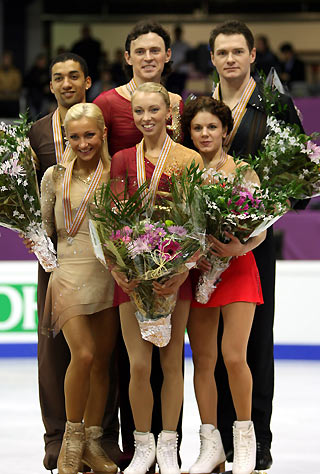 Silver medallists Aliona Savchenko and Robin Szolkowy of Germany (L), gold medallists Tatiana Totmianina and Maxim Marinin of Russia (C) and bronze medallists Maria Petrova and Alexei Tikhonov of Russia (R) pose on the podium after the Pairs skating event at the European figure skating championships in Lyon, central France, January 18, 2006. [Reuters]