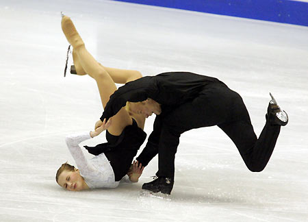 Olga Prokuronova (L) and Karel Stefel of the Czech Republic fall as they perform during the ice dancing original dance segment of the European Figure Skating Championships at the Palais des Sports ice rink in Lyon January 18, 2006.[Reuters]