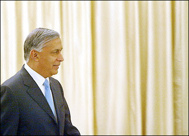 Pakistan Prime Minister Shaukat Aziz, pictured 14 January 2006, said Islamabad was working hard to capture Al-Qaeda leaders in the country's remote northwest region, ahead of meetings with US officials in Washington this week.(